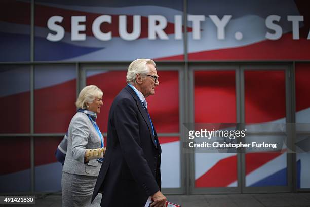 Lord Michael Heseltine and his wife Anne arrive for the second day of the Conservative Party Conference at Manchester Central on October 5, 2015 in...