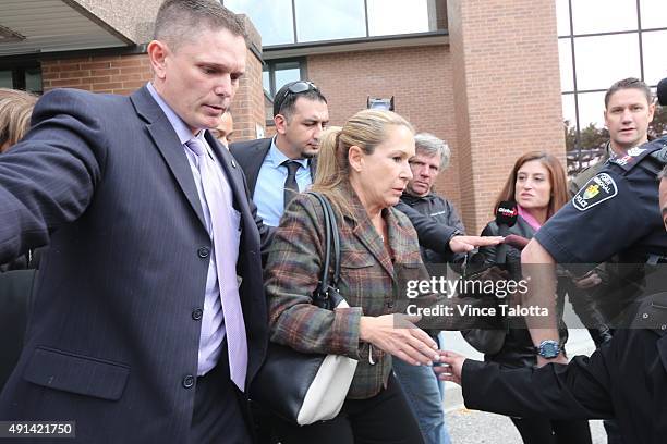 Dawn Muzzo leaves Newmarket Courthouse after a brief court appearance by her son Marco Muzzo who was charged with impaired driving causing death and...