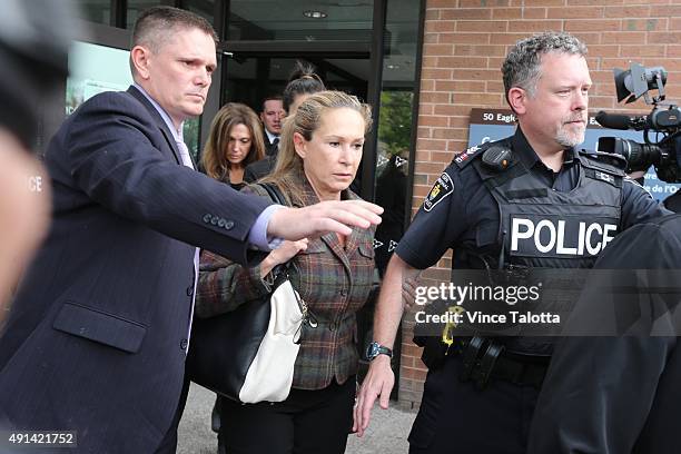 Dawn Muzzo leaves Newmarket Courthouse after a brief court appearance by her son Marco Muzzo who was charged with impaired driving causing death and...