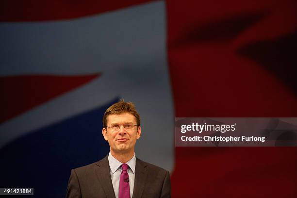 British Secretary of State for Communities and Local Government, Greg Clark, addresses delegates on the second day of the annual Conservative party...