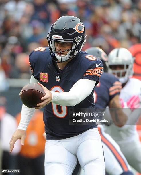 Jay Cutler of the Chicago Bears plays against the Oakland Raiders during the first quarter on October 4, 2015 at Soldier Field in Chicago, Illinois.
