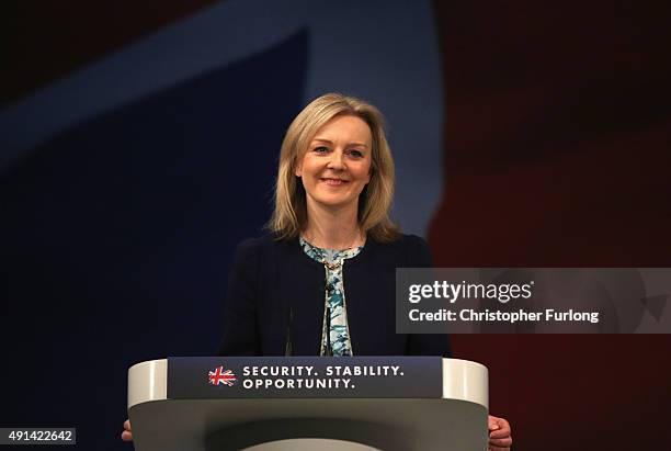 British Secretary of State for Environment, Food and Rural Affairs, Liz Truss, addresses delegates on the second day of the annual Conservative party...