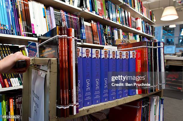 Store assistant pushes a trolley containing copies of "Call Me Dave" at Foyles bookshop on October 5, 2015 in London, England. Today Lord Ashcroft's...