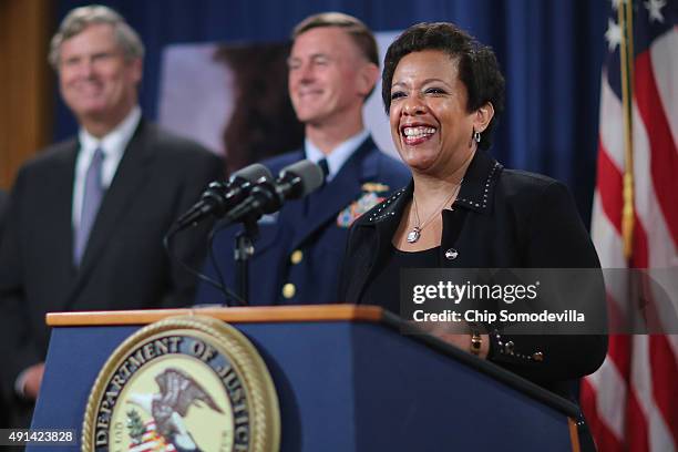 Attorney General Loretta E. Lynch is joined by Agriculture Secretary Tom Vilsack and Coast Guard Commandant Admiral Paul Zukunft as she announces the...