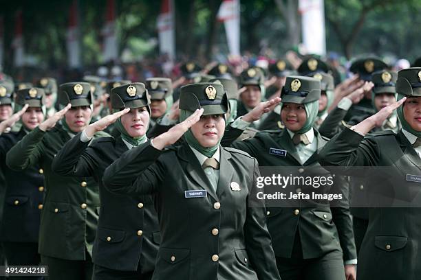 Women Contingent of Indonesian army march during the celebration ceremony of 70th anniversary of Indonesian Military on October 05, 2015 in Banda...