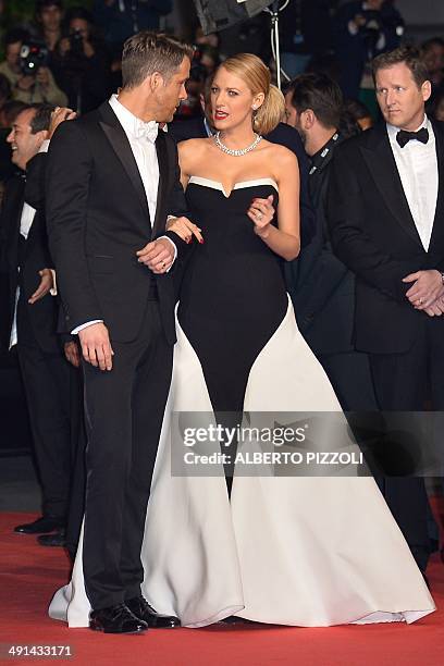 Canadian actor Ryan Reynolds and his wife US actress Blake Lively arrive for the screening of the film "Captives" at the 67th edition of the Cannes...