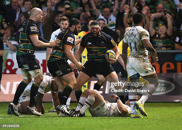 Tom Wood of Northampton Saints celebrates after scoring the last minute match winning try during the Aviva Premiership semi final match between...