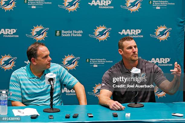 Executive Vice President of Football Operations Mike Tannenbaum looks on as newly appointed interim head coach Dan Campbell of the Miami Dolphins...