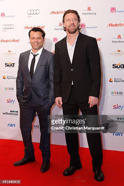 Markus Kavka and Steffen Freund attend the Deutscher Sportjournalistenpreis 2015 at Grand Elysee Hotel on October 5, 2015 in Hamburg, Germany.