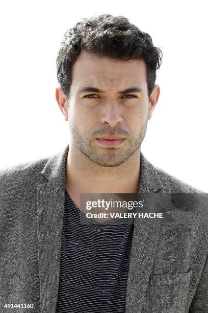 Welsh actor Tom Cullen poses for the photocall of the TV series "The Five" at the MIPCOM audiovisual trade fair in Cannes, southeastern France, on...