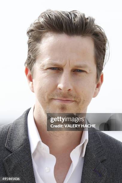 British actor Lee Ingleby poses for the photocall of the TV series "The Five" at the MIPCOM audiovisual trade fair in Cannes, southeastern France, on...