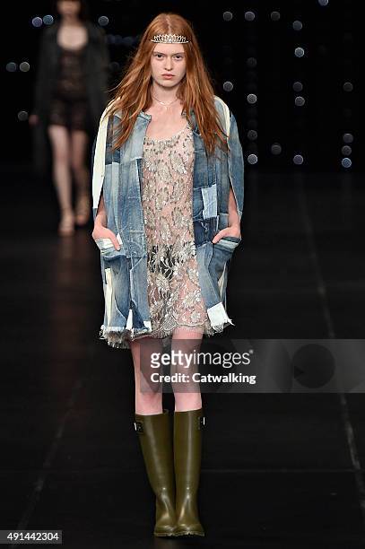 Model walks the runway at the Saint Laurent Spring Summer 2016 fashion show during Paris Fashion Week on October 5, 2015 in Paris, France.