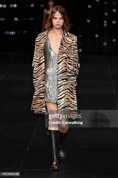 Model walks the runway at the Saint Laurent Spring Summer 2016 fashion show during Paris Fashion Week on October 5, 2015 in Paris, France.