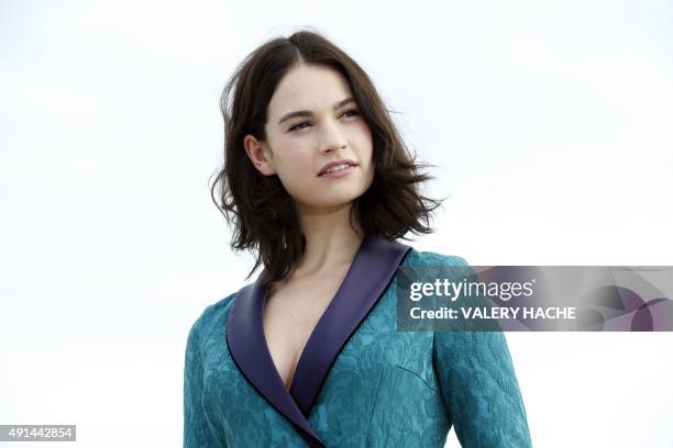 British actress Lily James poses for the photocall of the TV series "War and Peace" during the MIPCOM audiovisual trade fair in Cannes, southeastern...