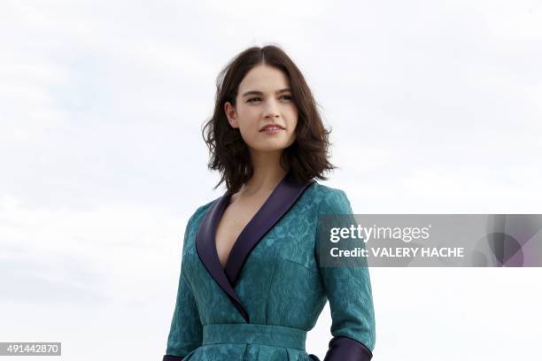 British actress Lily James poses for the photocall of the TV series "War and Peace" during the MIPCOM audiovisual trade fair in Cannes, southeastern...