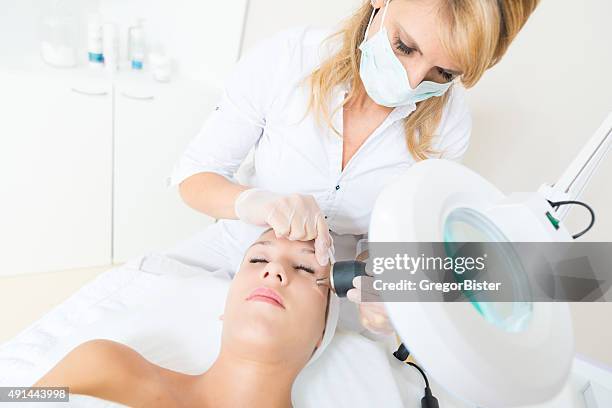 face treatment - beauty laser bildbanksfoton och bilder