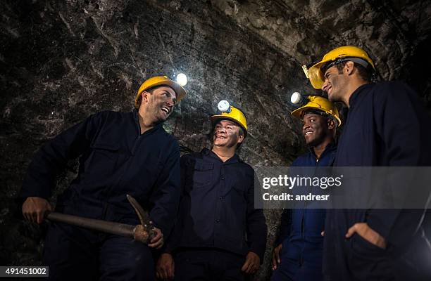 group of miners working at the mine - miner pick stock pictures, royalty-free photos & images