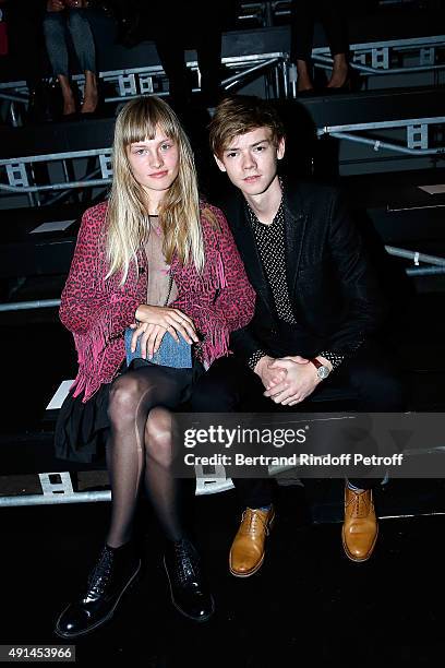 Actress Klara Kristin and Actor Thomas Brodie-Sangster attend the Saint Laurent show as part of the Paris Fashion Week Womenswear Spring/Summer 2016...