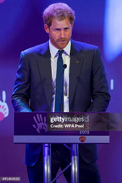 Prince Harry delivers a speech as he attends the WellChild Awards, which recognises the courage of seriously ill children, at the London Hilton on...