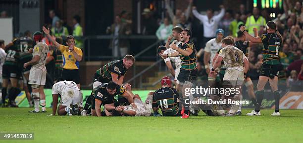 Ben Foden the Northampton fullback celebrates the final whistle after their victory during the Aviva Premiership semi final match between Northampton...