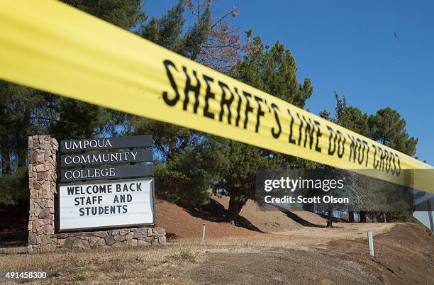 Sign at the edge of campus welcomes students and staff back to Umpqua Community College on October 5, 2015 in Roseburg, Oregon. Despite crime scene...