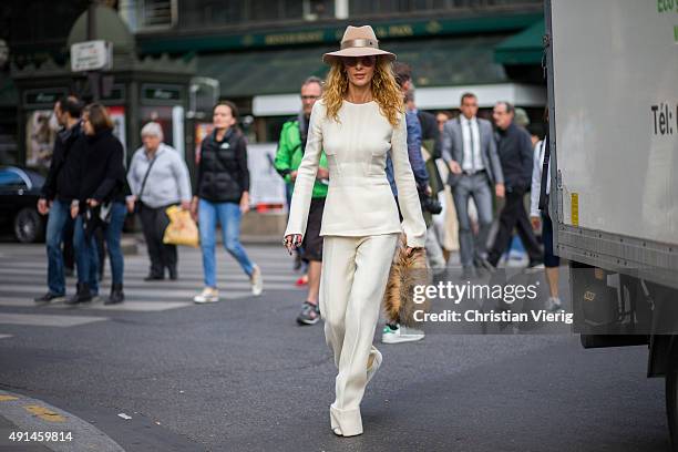 Elina Halimi wearing Stella McCartney and Maisonmichel hat after Stella McCartney during the Paris Fashion Week Womenswear Spring/Summer 2016 on...