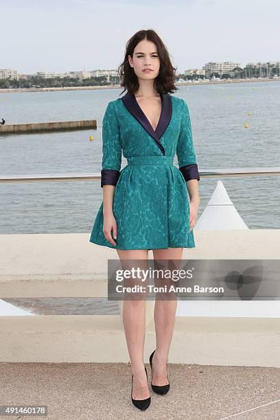 Lily James attends "Harvey Weinstein" photocall on La Croisette on October 5, 2015 in Cannes, France.