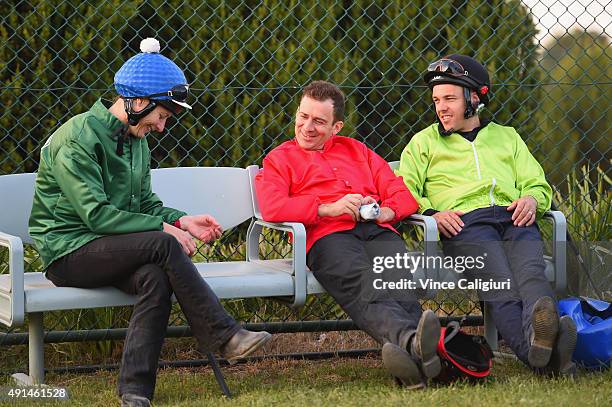 Linda Meech, Vlad Duric and Ryan Maloney waiting for jump outs to begin at Caulfield Racecourse on October 6, 2015 in Melbourne, Australia.