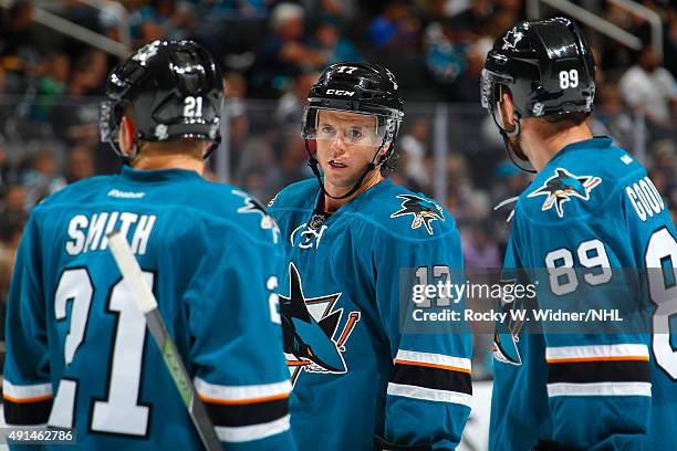 Ben Smith, John McCarthy and Barclay Goodrow of the San Jose Sharks skate against the Anaheim Ducks at SAP Center on September 26, 2015 in San Jose,...