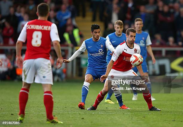 Matty Blair of Fleetwood Town controls the ball from Adam Reed of of York City during the Sky Bet League Two play off Semi Final second leg match...