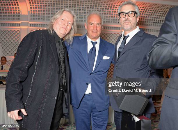 Christopher Hampton, Charles Finch and Alfonso Cuaron attend the annual Charles Finch Filmmakers Dinner during the 67th Cannes Film Festival at Hotel...