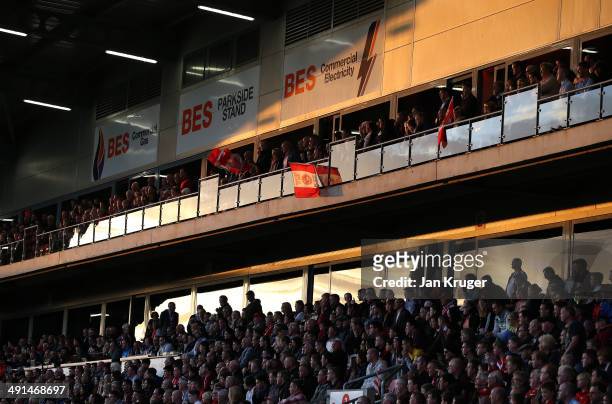 Fans look on as the sun sets during the Sky Bet League Two play off Semi Final second leg match between Fleetwood Town and York City at Highbury...