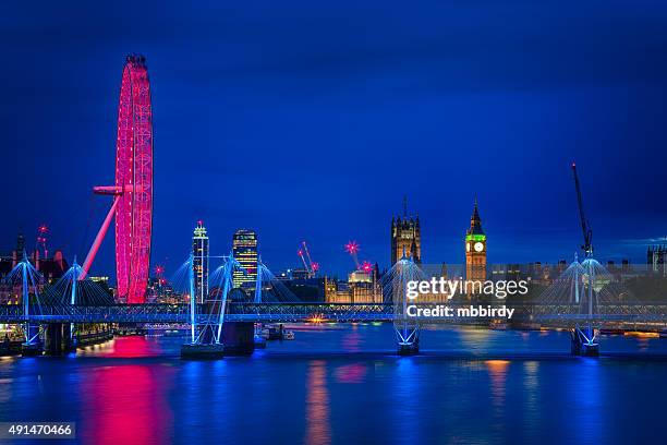 london cityscape along river thames with big ben at dusk - london eye stock pictures, royalty-free photos & images