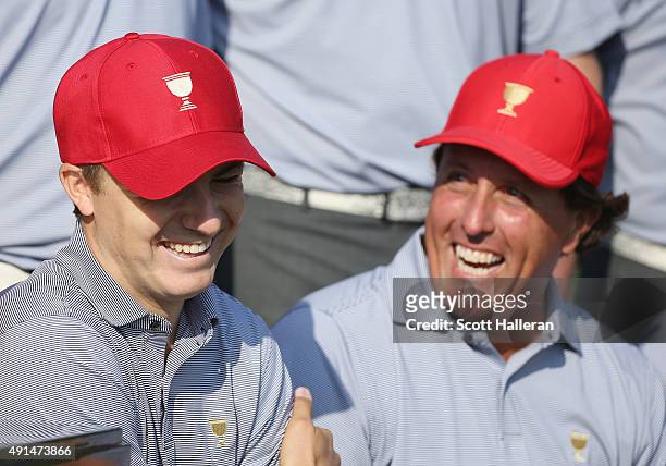 Jordan Spieth and Phil Mickelson of the United States team pose with his team during a photocall prior to the start of The Presidents Cup at the Jack...