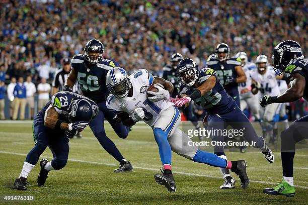 Calvin Johnson of the Detroit Lions runs with the ball during the fourth quarter against the Seattle Seahawks at CenturyLink Field on October 5, 2015...