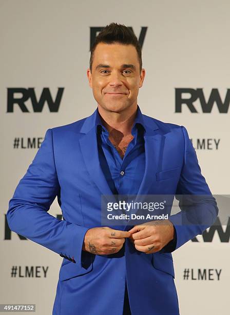 Robbie Williams speaks to the media during a press conference at The Langham Hotel on October 6, 2015 in Sydney, Australia.