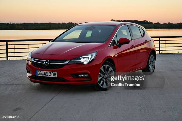 opel astra v in the sunset - astra stock pictures, royalty-free photos & images
