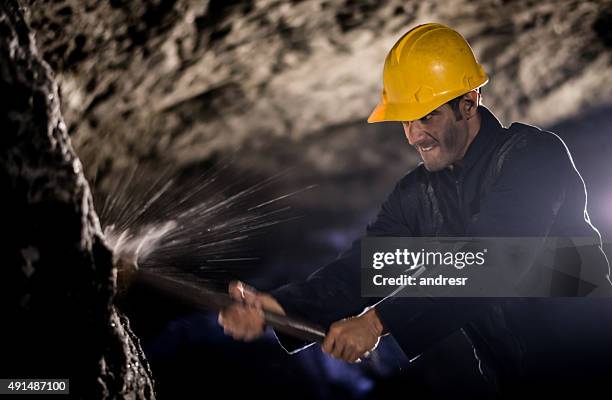 miner working at the mine - miner pick stock pictures, royalty-free photos & images