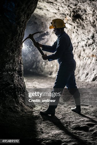 Miner working at a mine Miner working at a mine