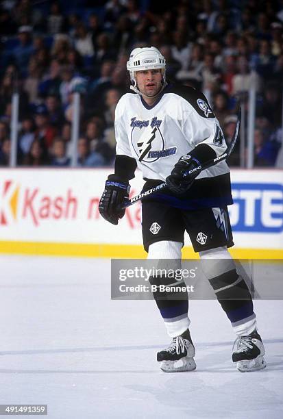 Roman Hamrlik of the Tampa Bay Lightning skates on the ice during an NHL game in February, 1996 at the Thunderdome in St. Petersburgh, Florida.