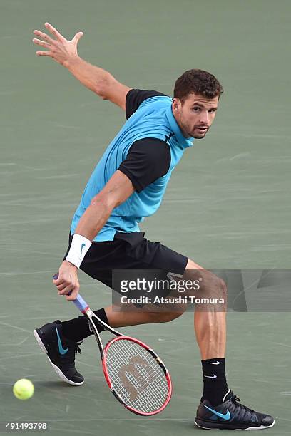 Grigor Dimitrov of Bulgaria competes against Benoit Paire of France during the men's singles first round match on day two of Rakuten Open 2015 at...
