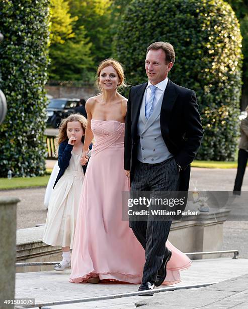 Geri Halliwell and Bluebell Halliwell seen at Poppy Delevingnes wedding held in Kensington Palace Gardens on May 16, 2014 in London, England.