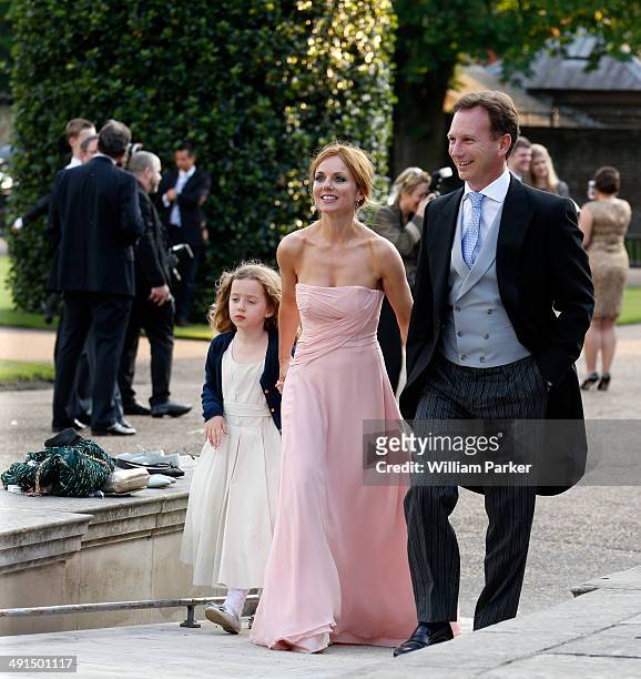 Geri Halliwell and Bluebell Halliwell seen at Poppy Delevingnes wedding held in Kensington Palace Gardens on May 16, 2014 in London, England.