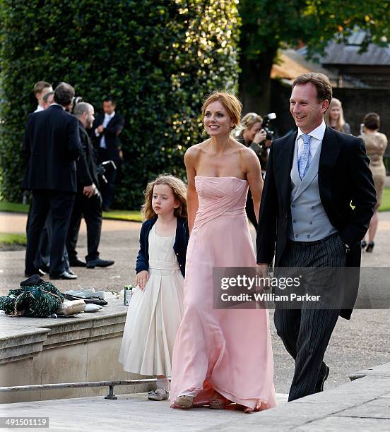 Geri Halliwell and Bluebell Halliwell seen at Poppy Delevingnes wedding held in Kensington Palace Gardens on May 16, 2014 in London, England.