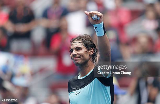 Rafael Nadal of Spain celebrates winning his semifinal match against Wu Di of China during the Men's singles first round match on day four of the...
