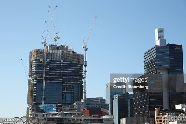 Cranes operate on the construction site of Lend Lease Group's Barangaroo redevelopment in Sydney, Australia, on Friday, Oct. 2, 2015. Barangaroo is a...