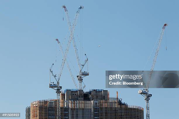 Cranes operate on the construction site of Lend Lease Group's Barangaroo redevelopment in Sydney, Australia, on Friday, Oct. 2, 2015. Barangaroo is a...