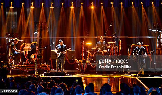 Frontman Chris Martin, guitarist Jonny Buckland, drummer Will Champion and bassist Guy Berryman of Coldplay perform at the 2015 iHeartRadio Music...