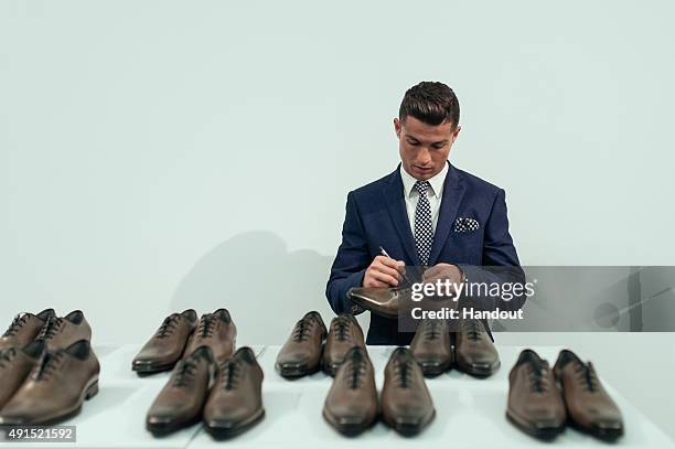 Cristiano Ronaldo signs 10 pairs of CR7 Footwear during the global launch of his FW15 collection. Each pair will be put in to circulation to be...