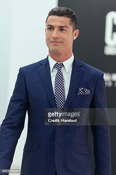 Cristiano Ronaldo makes his catwalk debut to model new styles at the global launch of his FW15 CR7 Footwear collection on October 5, 2015 in...
